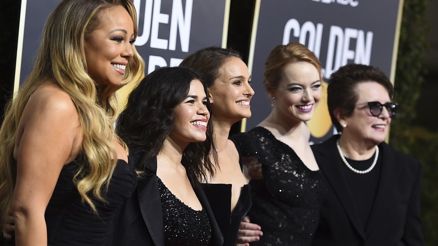 Mariah Carey, from left, America Ferrera, Natalie Portman, Emma Stone and Billie Jean King arrive at the 75th annual Golden Globe Awards at the Beverly Hilton Hotel on Sunday, Jan. 7, 2018, in Beverly ...