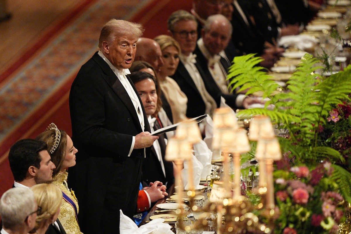 U.S. President Donald Trump, fourth left, listens as Britain's King Charles gives a speech during the State Banquet in Windsor Castle, England, on day one of U.S. President Donald Trump and First ...