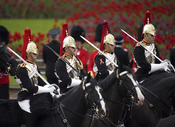 Members of the Household Cavalry make their way along The Mall ahead of the coronation ceremony of Britain&#039;s King Charles III, in London, Saturday May 6, 2023. (Niall Carson/PA via AP)