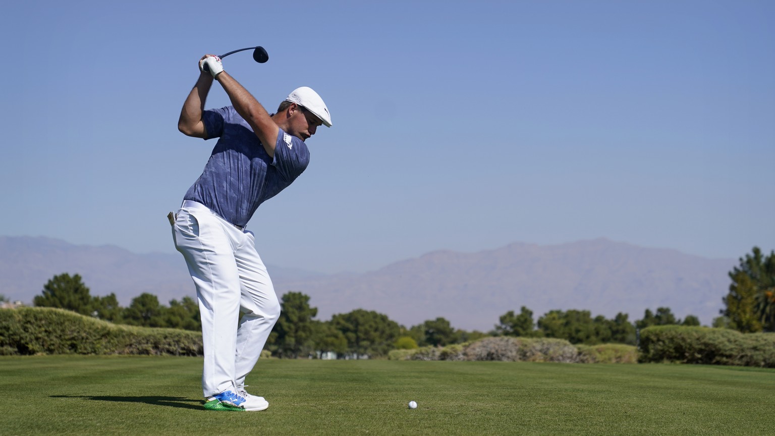 Bryson DeChambeau hits off the 10th tee during the final round of Shriners Hospitals for Children Open golf tournament Sunday, Oct. 11, 2020, in Las Vegas. (AP Photo/John Locher)