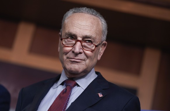 FILE -Senate Majority Leader Chuck Schumer, D-N.Y., speaks to reporters after a closed-door policy meeting, at the Capitol in Washington, Tuesday, Aug. 2, 2022. Senate Majority Leader Chuck Schumer, D ...