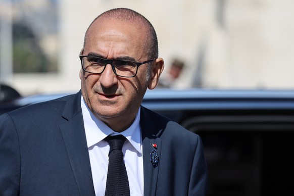 French Interior Minister Laurent Nunez arrives for a ceremony at the Arc de Triomphe monument in Paris, Friday May 8, 2026, marking the 81st anniversary of Victory in Europe Day, which commemorates th ...