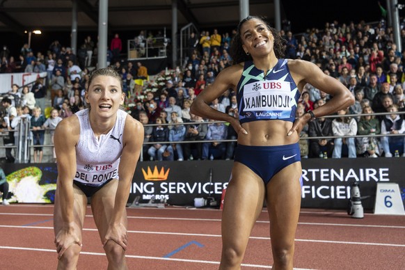 Ajla Del Ponte, left, and Mujinga Kambundji of Switzerland react after their 100m Women at the Athletissima IAAF Diamond League international athletics meeting at the Stade Olympique de la Pontaise in ...