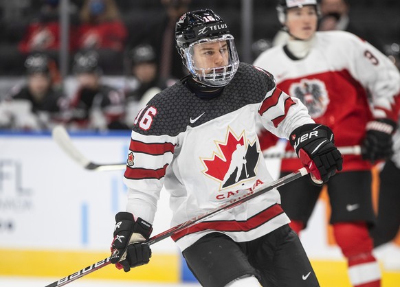 Canada&#039;s Connor Bedard (16) skates against Austria during the third period of an IIHF junior world hockey championships game Tuesday, Dec. 28, 2021 in Edmonton, Alberta. (Jason Franson/The Canadi ...
