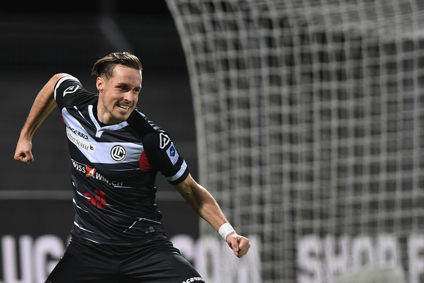 Lugano&#039;s player Michael Facchinetti celebrates the 2-0 goal, during the Super League soccer match FC Lugano against FC Sion, at the Cornaredo stadium in Lugano, on Sunday, 5 December 2021. (KEYST ...