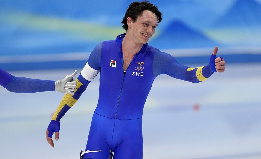 Nils van der Poel of Sweden reacts after breaking his own world record in the men&#039;s speedskating 10,000-meter race at the 2022 Winter Olympics, Friday, Feb. 11, 2022, in Beijing. (AP Photo/Sue Og ...