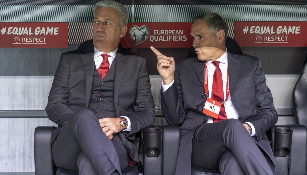 Switzerland's head coach Vladimir Petkovic, left, and Pierluigi Tami, director of the national team, right, prior to the UEFA Euro 2020 qualifying Group D soccer match between Denmark and Switzer ...