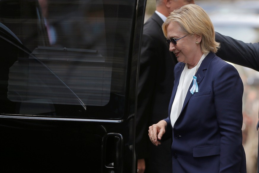 U.S. Democratic presidential candidate Hillary Clinton climbs into her van outside her daughter Chelsea&#039;s home in New York, New York, United States September 11, 2016, after Clinton left ceremoni ...