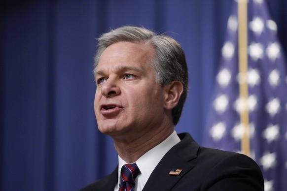 FBI Director Christopher Wray speaks during a news conference at the Department of Justice in Washington, Friday, Jan. 27, 2023. The Justice Department has charged three men in a plot to kill an Irani ...