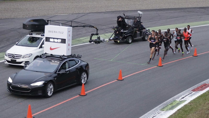 Athletes compete in the marathon at the Monza Formula One racetrack, Italy, Saturday, May 6, 2017. Olympic marathon champion Eliud Kipchoge won the race and was 26 seconds from making history on Satur ...