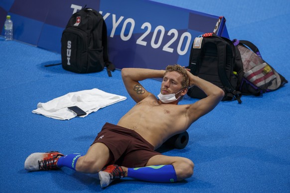 epa09357994 Jeremy Desplanches of Switzerland is pictured during a training session prior to the start of the Swimming events of the Tokyo 2020 Olympic Games at the Tokyo Aquatics Centre in Tokyo, Jap ...