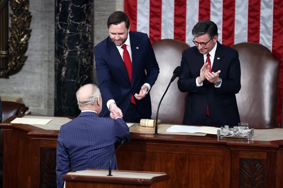 epa12920082 US Vice President JD Vance shakes hands with Britain's King Charles III during an address to a joint meeting of Congress in the US Capitol in Washington DC USA, 28 April 2026. King Ch ...