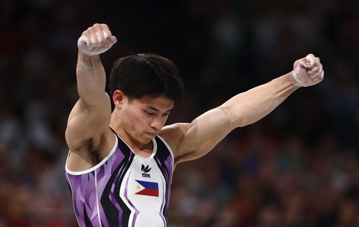 PARIS, FRANCE - AUGUST 04: Carlos Edriel Yulo of Team Philippines reacts after finishing his routine during the Artistic Gymnastics Men's Vault Final on day nine of the Olympic Games Paris 2024 a ...