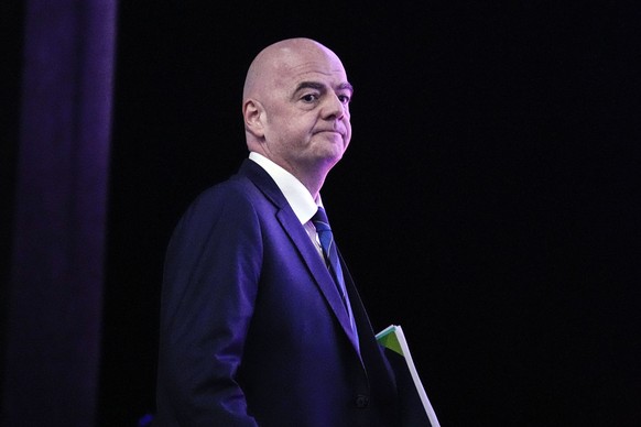 FIFA President Gianni Infantino arrives to meet the media at the FIFA World Cup closing press conference in Doha, Qatar, Friday, Dec. 16, 2022. (AP Photo/Martin Meissner)