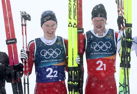 epa12757458 First placed Andreas Skoglund (R) and Jens Luraas Oftebro of Norway celebrate in the finish area after the Team Sprint 2x7.5km/Large Hill of the Nordic Combined competitions at the Milano  ...