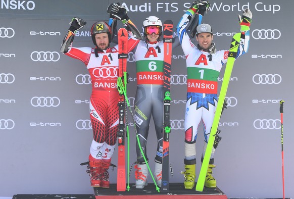 epa07392474 First placed Henrik Kristoffersen (C) of Norway celebrates on the podium next to second placed Marcel Hirscher of Austria (L) and third placed Thomas Fanara (R) of France after the Men&#03 ...