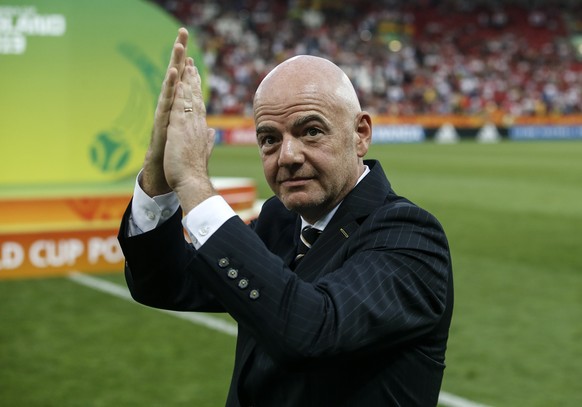 FIFA President Gianni Infantino claps hands on the pitch after the final match between Ukraine and South Korea at the U20 soccer World Cup in Lodz, Poland, Saturday, June 15, 2019. (AP Photo/Darko Voj ...
