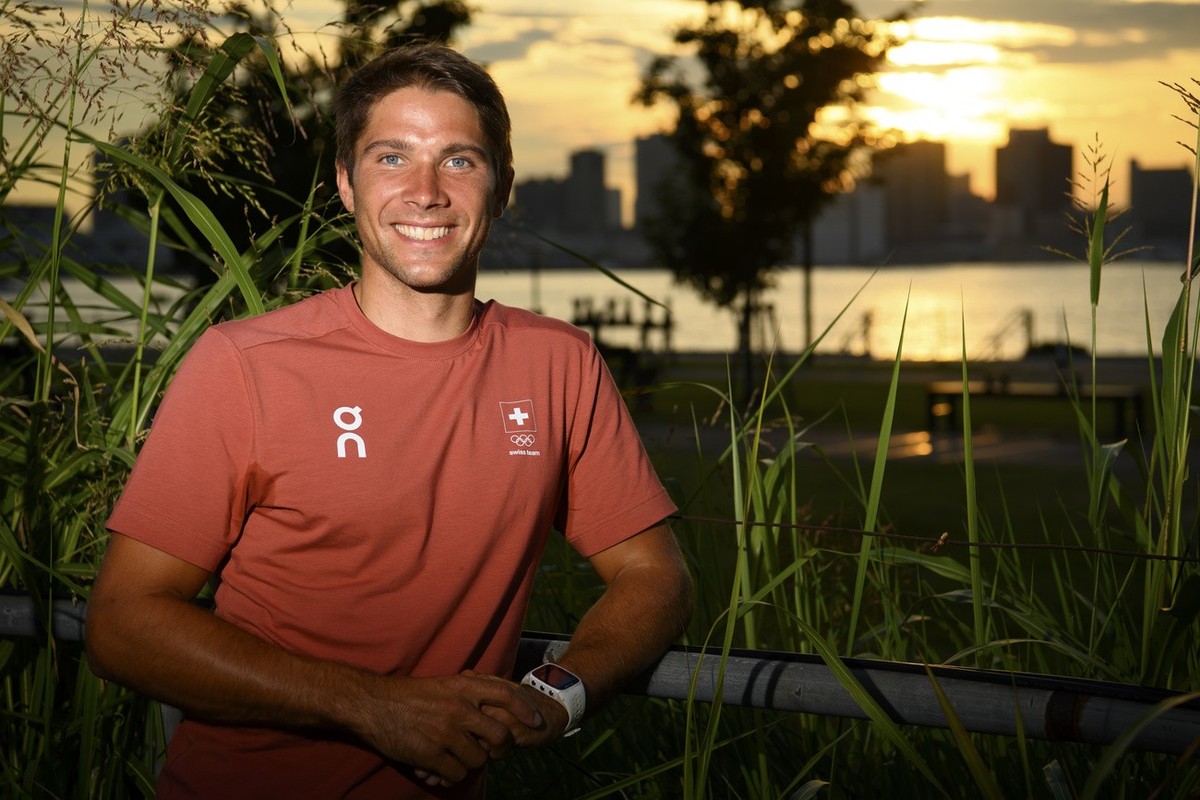 Swiss athlete in Canoe Martin Dougoud poses for photographer after a virtual press conference at the 2020 Summer Olympics, in Tokyo, Japan, Wednesday, July 21, 2021. (KEYSTONE/Laurent Gillieron)