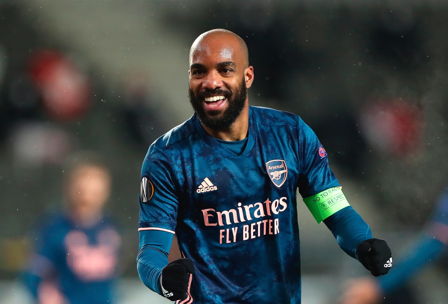 epa09138116 Arsenal&#039;s captain Alexandre Lacazette celebrates after scoring the 4-0 lead during the UEFA Europa League quarter final, second leg soccer match between Slavia Prague and Arsenal FC i ...