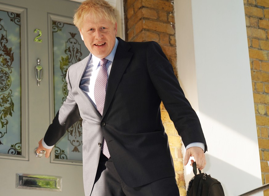 epa07654976 Conservative party leadership candidate Boris Johnson leaves his house in London, Britain, 18 June 2019. Johnson will appear in a BBC live debate among the remaining conservative candidate ...