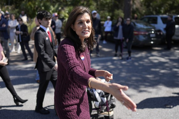Republican presidential candidate former UN Ambassador Nikki Haley greets a supporter after voting Saturday, Feb. 24, 2024, in Kiawah Island, S.C. (AP Photo/Chris Carlson)