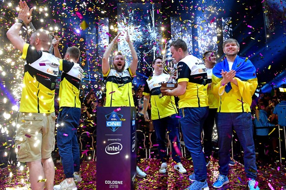 epa06874300 Ukrainian e-sport team &#039;Natus Vincere&#039; celebrates with the trophy after winning their final against the German team &#039;BIG&#039; (Berlin International Gaming), of the ESL One  ...