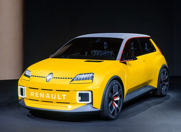 epa08938773 A handout photo made available 15 January 2021 by French car maker Renault, showing .Renault Group CEO Luca de Meo presenting the prototype of the Renault R5 that Renault has developed as  ...