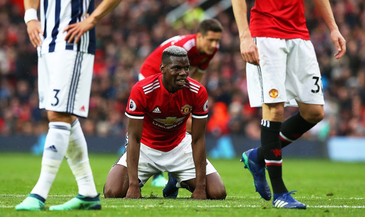 epa06671345 Manchester United's Paul Pogba (C) reacts during the English Premier League soccer match between Manchester United and West Bromwich Albion at Old Trafford in Manchester, Britain, 15  ...