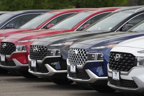 A line of 2022 Santa Fe SUV&#039;s sit outside a Hyundai dealership Sunday, Sept. 12, 2021, in Littleton, Colo. Nearly three months after Hyundai and Kia rolled out new software designed to thwart ram ...