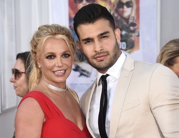 FILE - Britney Spears and Sam Asghari appear at the Los Angeles premiere of &quot;Once Upon a Time in Hollywood&quot; on July 22, 2019. Spears has married her longtime partner Sam Asghari at a Souther ...