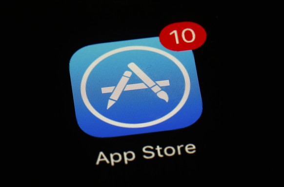 FILE - Apple&#039;s App Store icon is displayed on an iPad in Baltimore, March 19, 2018. Apple has unveiled a sweeping plan to tear down some of the competitive barriers that it has built around its l ...