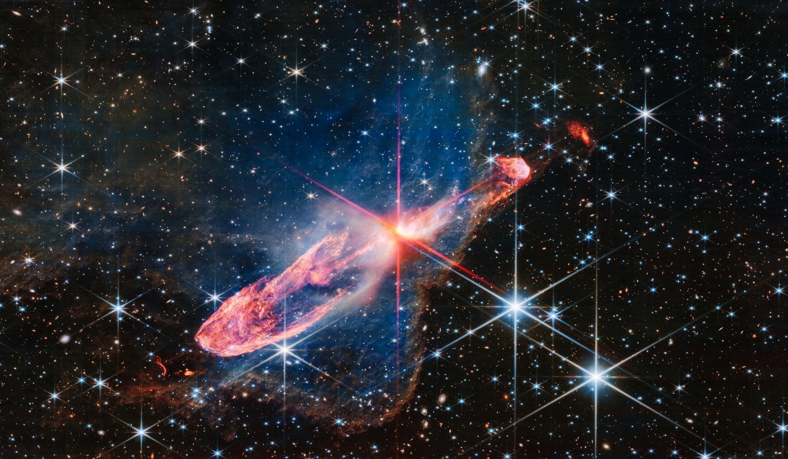 NASA’s James Webb Space Telescope has captured a tightly bound pair of actively forming stars, known as Herbig-Haro 46/47, in high-resolution near-infrared light. Look for them at the center of the re ...