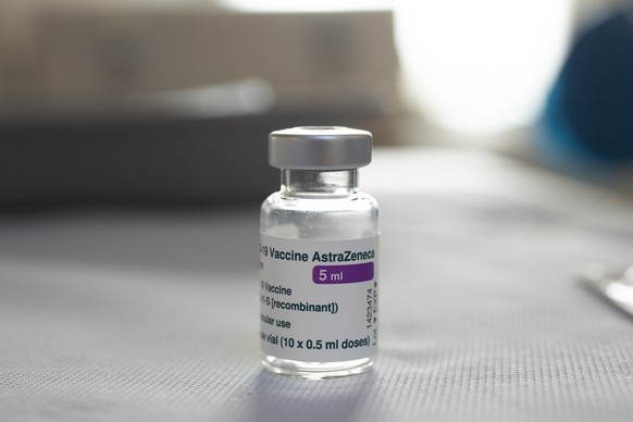 A vial of AstraZeneca vaccine against COVID-19 sits on a general practitioner&#039;s table during a vaccination campaign in Amsterdam, Netherlands, Wednesday, April 14, 2021. (AP Photo/Peter Dejong)