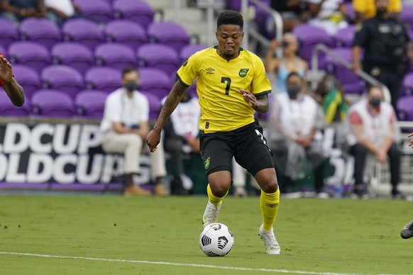 FILE - In this file photo dated Monday, July 12, 2021, Jamaica forward Leon Bailey moves the ball against Suriname during the first half of a CONCACAF Gold Cup Group C soccer match, in Orlando, USA. E ...