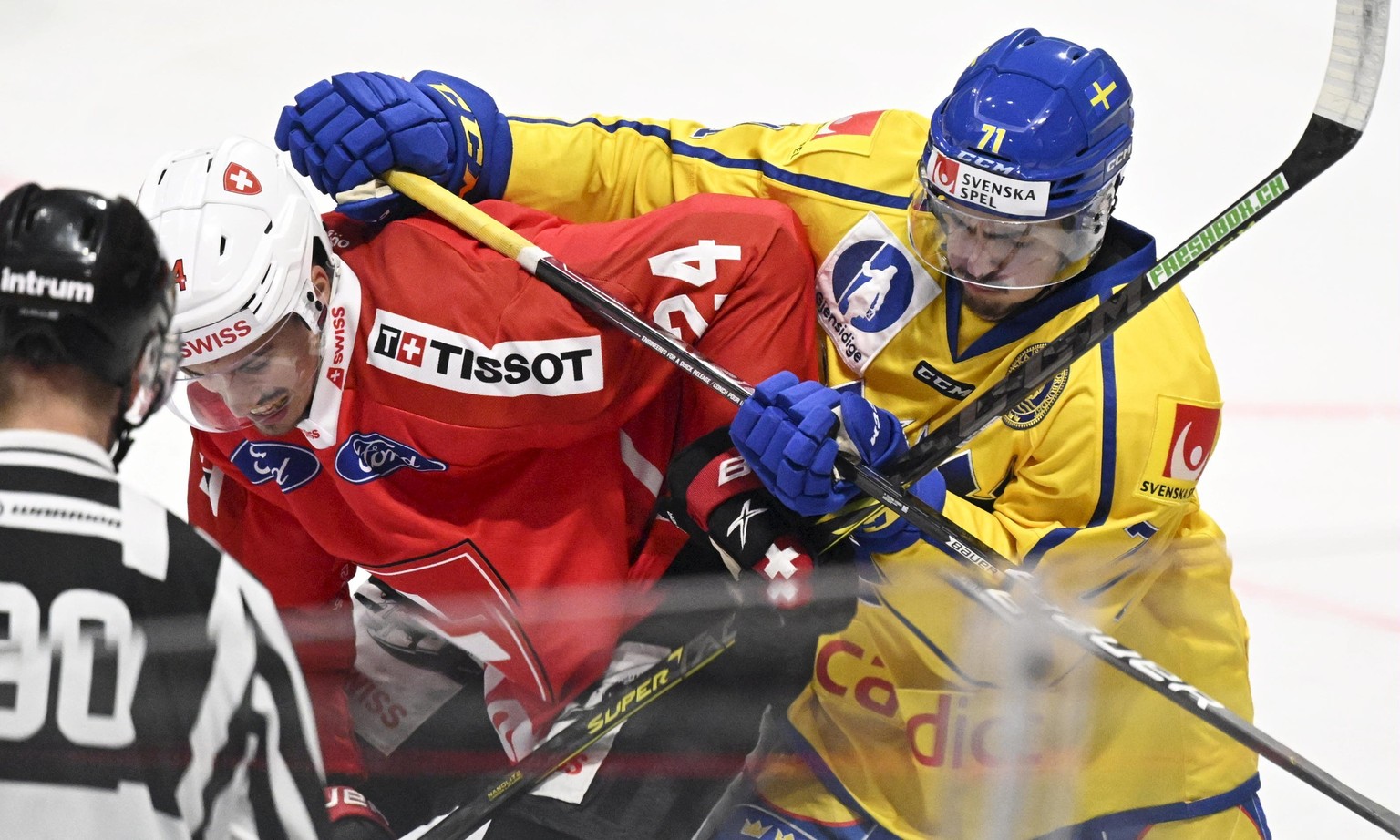 Isac BrAnnstrom of Sweden, right, and Tobias Geissler of Switzerland in action during the ice hockey Euro Hockey Tour EHT Karjala Cup match between Sweden and Switzerland in Turku, Finland, November 1 ...