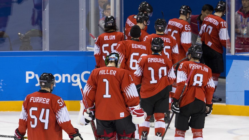 Players of Switzerland react after the men ice hockey play-off qualification match between Switzerland and Germany in the Kwandong Hockey Center in Gangneung during the XXIII Winter Olympics 2018 in P ...