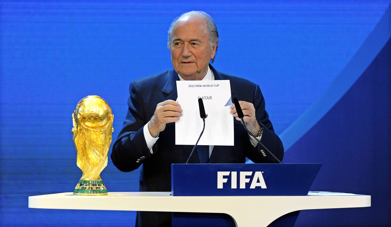 epa07655093 (FILE) - FIFA president Joseph S. Blatter announces that Qatar will be hosting the 2022 Soccer World Cup during the FIFA 2018 and 2022 World Cup Bid Announcement in Zurich, Switzerland, 02 ...