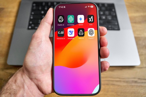 Bavaria, Germany - 22 May 2025: PHOTOMONTAGE, smartphone with open app menu shows various AI applications such as ChatGPT, Gemini, Grok or Character.AI - the symbols stand for text-based assistants an ...