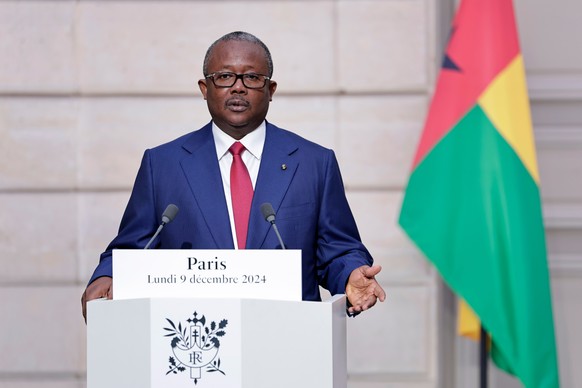 FILE - Guinea-Bissau&#039;s President Umaro Sissoco Embalo speaks during a joint press conference with French president at the Elysee Presidential Palace in Paris Monday Dec. 9, 2024. (Stephane de Sak ...