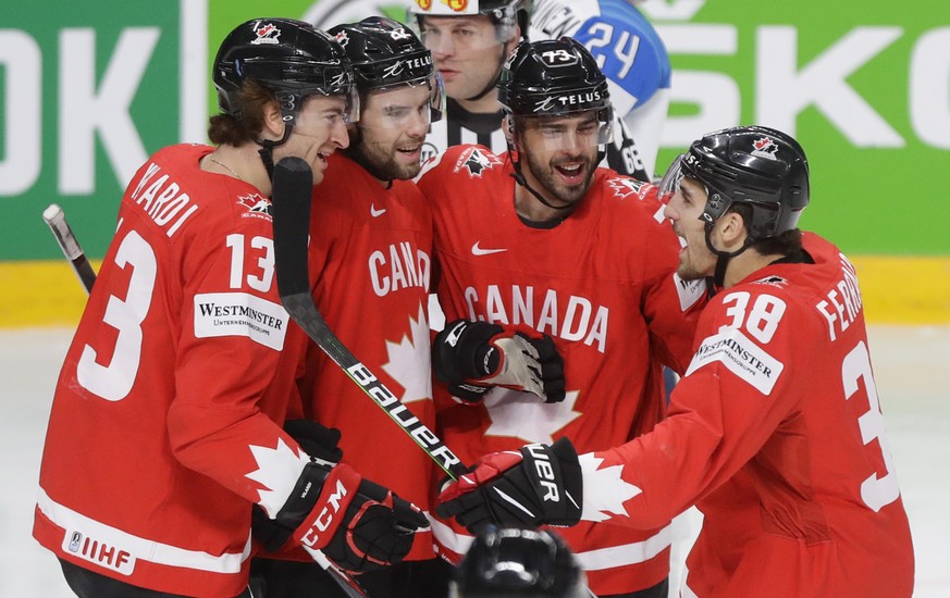 Canada&#039;s players celebrate after Canada&#039;s Brandon Pirri scored his side&#039;s opening goal during the Ice Hockey World Championship group B match between Canada and Finland at the Arena in  ...