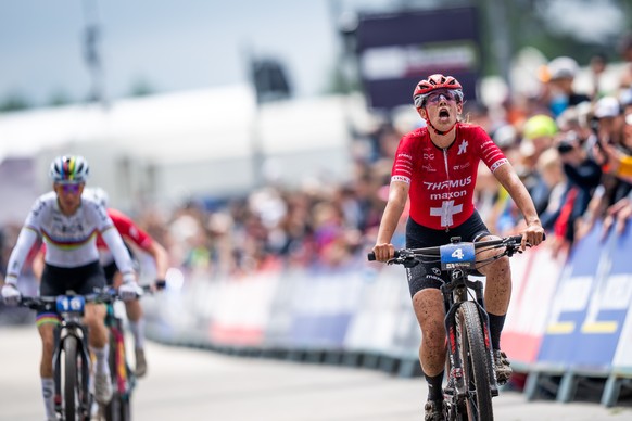 Alessandra Keller from Switzerland, 1st, cross the finish line of the Short Track Women Elite, XCC, WHOOP UCI Mountain Bike World Series, on Saturday, May 25, 2024, in Nove Mesto, Czech Republic. (KEY ...