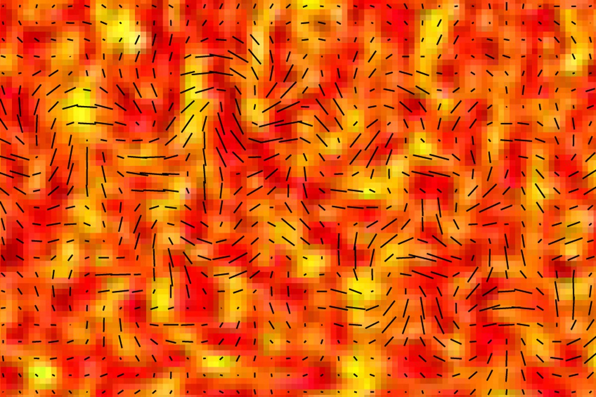 This image provided by the BICEP2 Collaboration shows slight temperature fluctuations, indicated by variations in color, of the cosmic microwave background of a small patch of sky and the orientation  ...