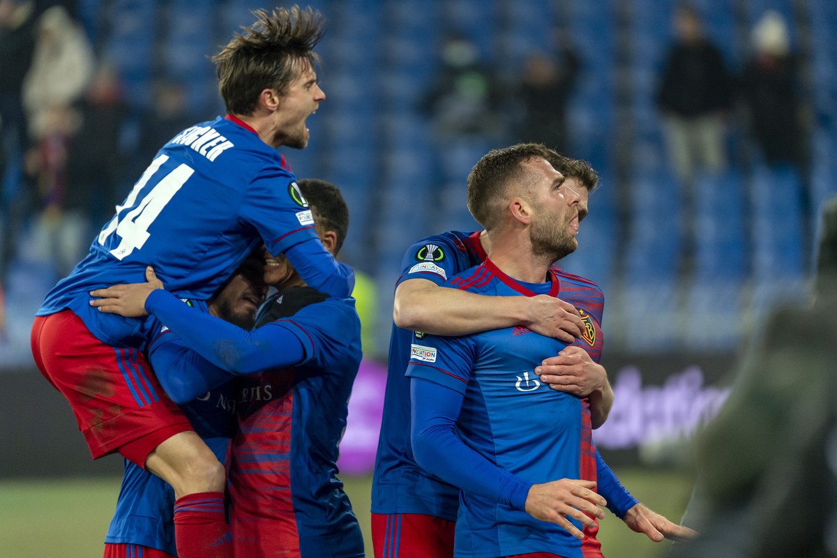 Basel's Pajtim Kasami, right, cheers after scoring during the UEFA Conference League group H soccer match between Switzerland's FC Basel 1893 and Azerbaijan's Qarabag FK at the St. Jako ...