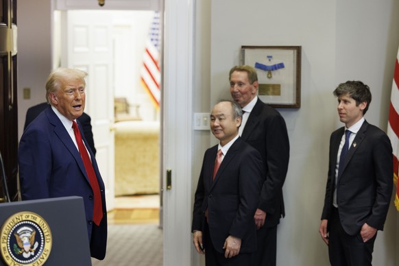 epa11843503 US President Donald Trump (L) gives remarks on artificial intelligence (AI) Infrastructure as Larry Ellison (2-R), Chief technology officer of Oracle, Masayoshi Son (2-L), CEO of SoftBank, ...