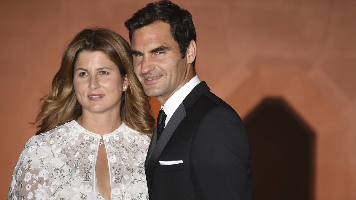 Wimbledon champion Switzerland's Roger Federer and his wife Mirka arrive at the Wimbledon Champions Dinner 2017, at the Guildhall, London, Sunday July 16, 2017. (Lauren Hurley/PA via AP)