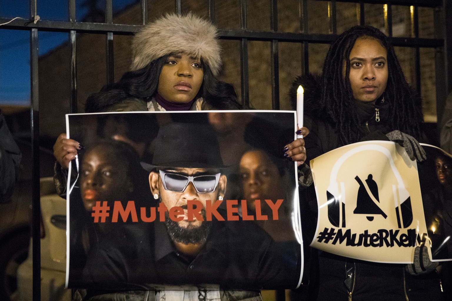 #MuteRKelly supporters protest outside R. Kelly's studio, Wednesday, Jan. 9, 2019 in Chicago. Lifetime's &quot;Surviving R. Kelly&quot; series which aired earlier this month, looks at the singer's his ...