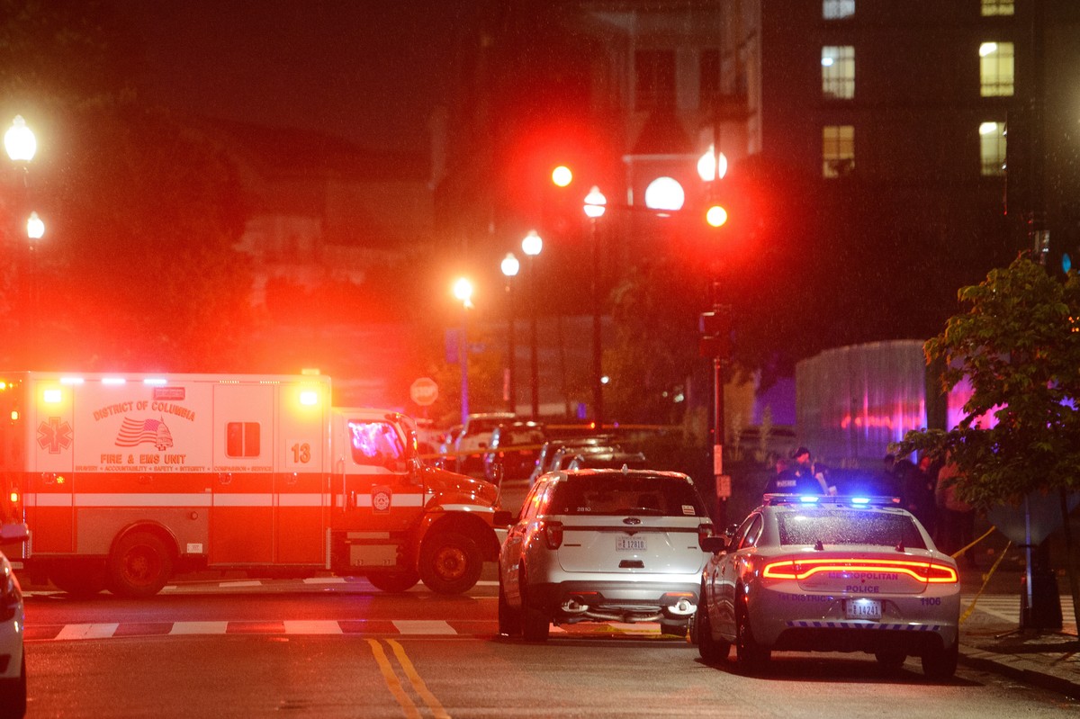 Law enforcement work the scene after two staff members of the Israeli Embassy in Washington were shot and killed outside the Capital Jewish Museum, Thursday, May 22, 2025, in Washington. (AP Photo/Rod ...
