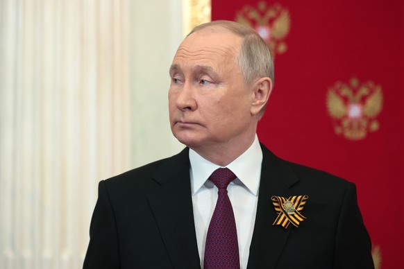epa10616879 Russian President Vladimir Putin stands at the Kremlin before a Victory Day military parade on Red Square in Moscow, Russia, 09 May 2023. Russia marks the 78th anniversary of the victory i ...