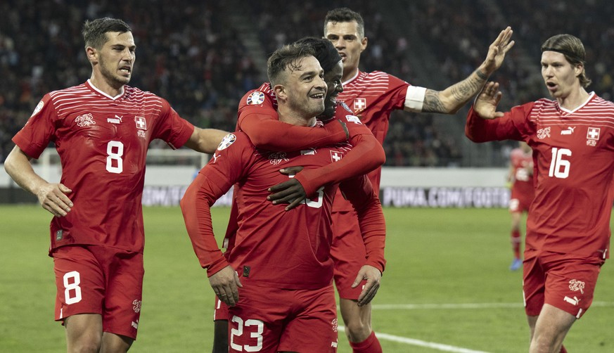 Switzerland&#039;s Xherdan Shaqiri, front, celebrates after scoring the opening goal during the Euro 2024 group I qualifying soccer match between Switzerland and Belarus in St. Gallen, Switzerland, Su ...