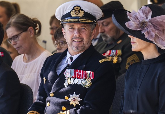 Danish Crown Prince Frederik, second from right, and Crown Princess Mary, right, attend a wreath-laying ceremony during the annual Flag Day at Kastellet in Copenhagen, Denmark, Tuesday, September 5, 2023, at…